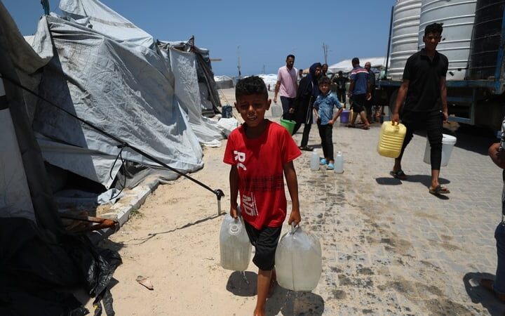 60 killed in Gaza attacks, many near aid site - medics