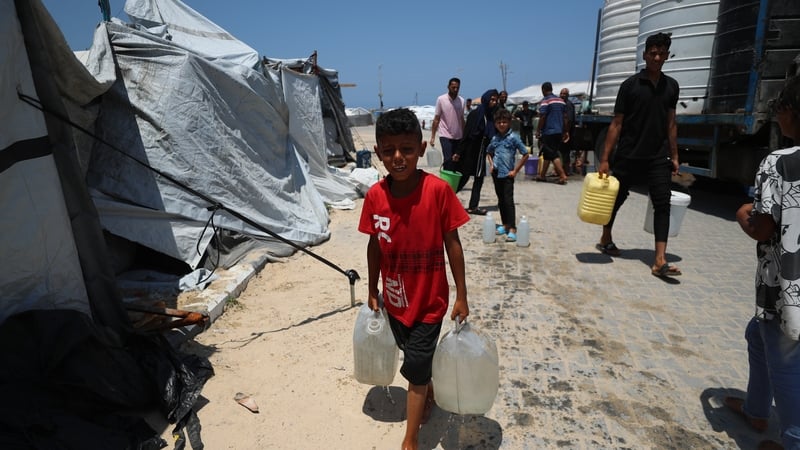 60 killed in Gaza attacks, many near aid site - medics