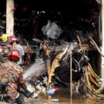At least 19 killed as Bangladeshi air force jet crashes into college campus