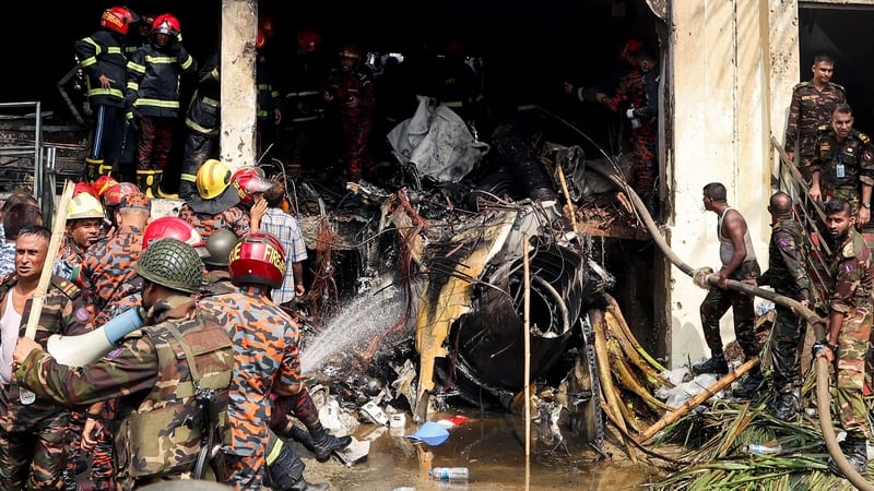 At least 19 killed as Bangladeshi air force jet crashes into college campus