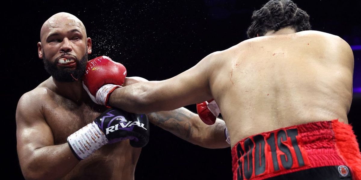 Frazer Clarke departs ring after loss to Jeamie TKV in Derby boxing match