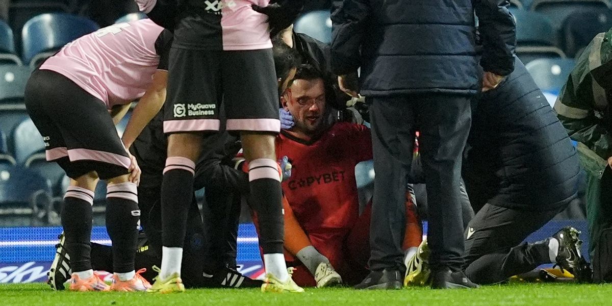 Game interrupted as QPR goalkeeper suffers severe facial injury in collision