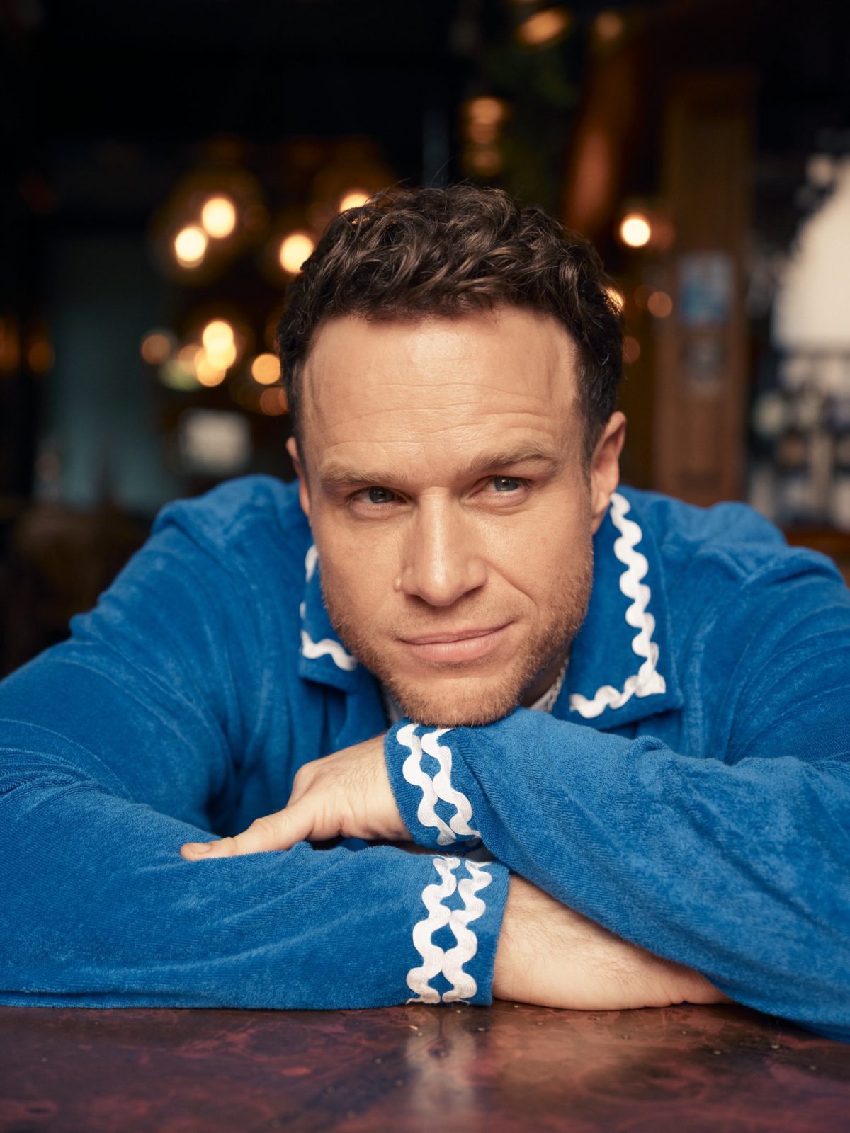 Olly Murs reflects on his music journey and aims to connect with a male audience