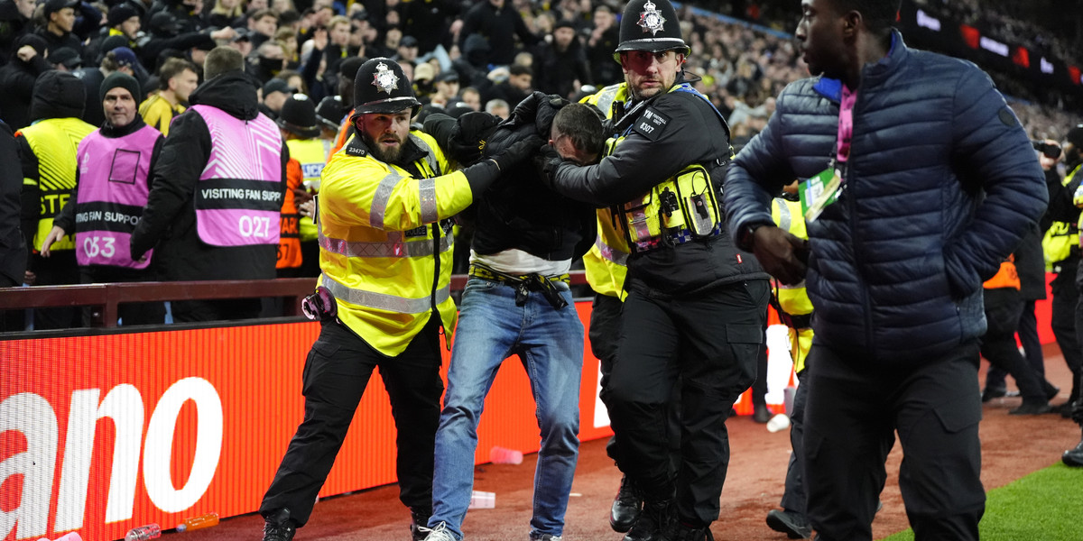 Violence breaks out at Aston Villa match as police officers are assaulted by fans