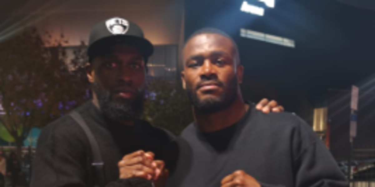 Anthony Holloway collapses in the ring and is stretchered out after loss to Chev Clarke