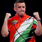 Darts player balances NHS job and World Championship preparation as pressures mount