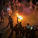 Iran warns of targeting U.S. bases amid ongoing protests and rising death toll