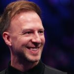 Judd Trump secures Masters quarter-final spot with dominant win over Ding Junhui