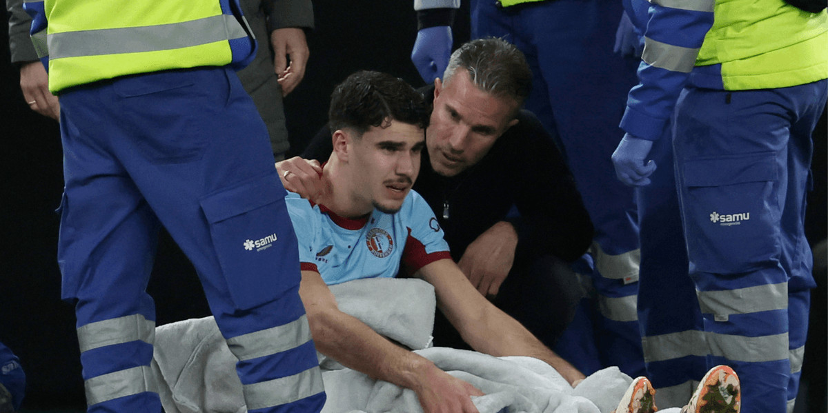 Robin van Persie rushes to comfort injured son during Feyenoord match against Real Betis