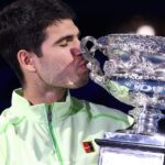Carlos Alcaraz claims historic Australian Open title, defeating Novak Djokovic in final