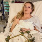 Lindsey Vonn returns to the US after extensive treatment for serious Olympic crash injuries