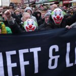 Manchester United supporters protest outside Old Trafford, demanding urgent changes from club ownership