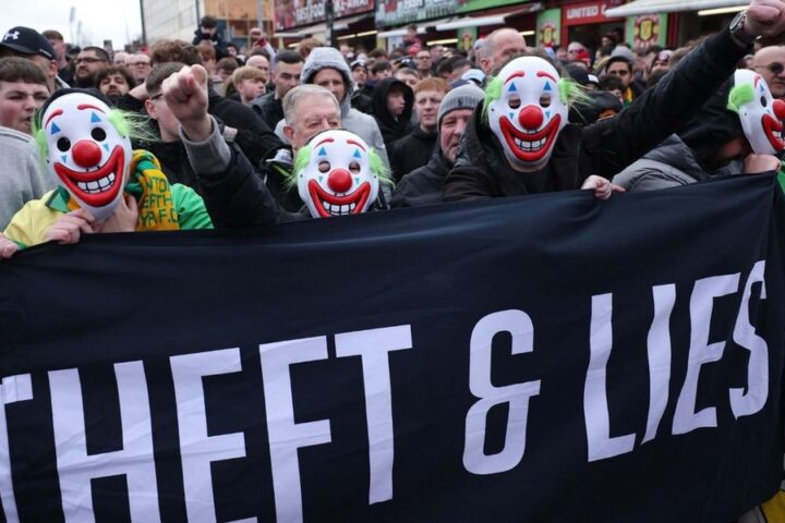 Manchester United supporters protest outside Old Trafford, demanding urgent changes from club ownership