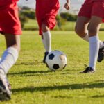 NFL evaluates grass versus turf for improved safety and performance in youth sports