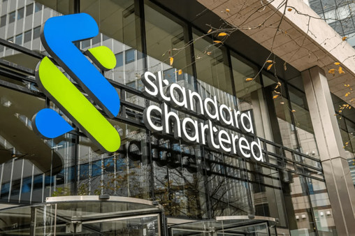 Standard Chartered announces £1.2bn share buyback and dividend increase despite profit miss
