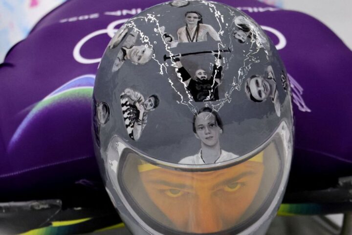 Ukrainian athlete protests against Russia at Winter Olympics by honoring war victims on helmet