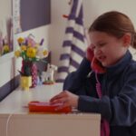 Young children embrace landlines, sparking nostalgia and joy among parents