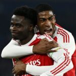 Arsenal secures narrow victory over Brighton, extending Premier League title race lead