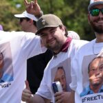 Golf fans show support for Tiger Woods with mugshot shirts at Houston Open