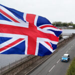 Government strategy links national flags to hate symbols, raising concerns over community cohesion