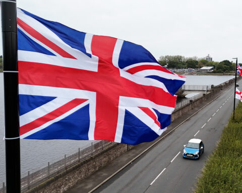 Government strategy links national flags to hate symbols, raising concerns over community cohesion
