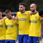 Hashtag United's relegation request ignites controversy among fans as club prioritizes sustainability