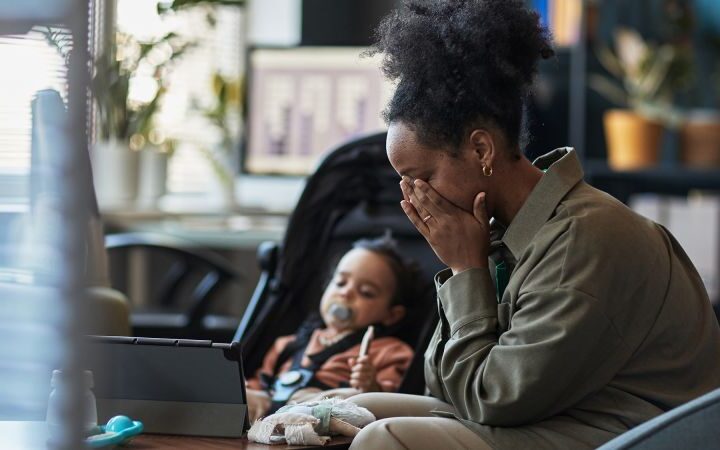 Mothers face pressure to meet unrealistic standards in parenting, says author