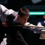 15-year-old snooker player Michal Szubarczyk sets record as youngest World Championship match winner