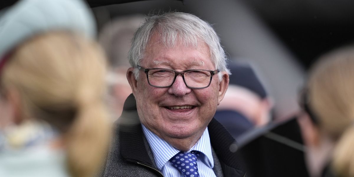 Alex Ferguson celebrates Wade Out's victory at Aintree on Grand National day