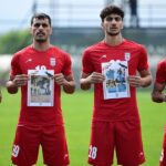 Iranian footballers protest child casualties from US and Israeli strikes during warm-up match