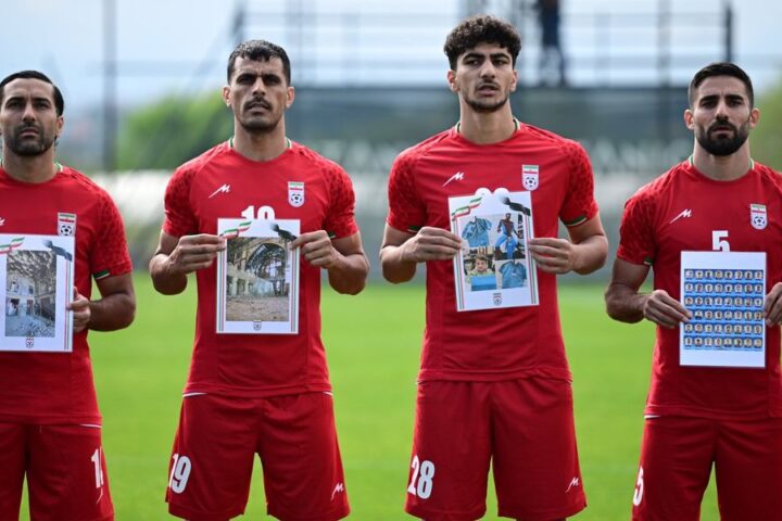 Iranian footballers protest child casualties from US and Israeli strikes during warm-up match