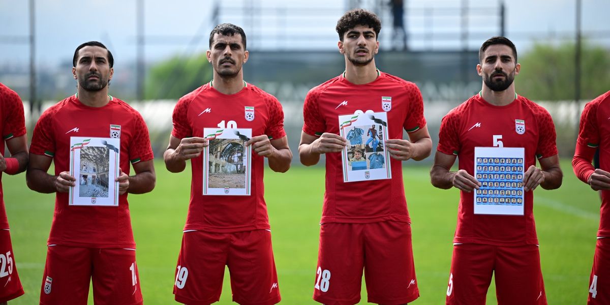 Iranian footballers protest child casualties from US and Israeli strikes during warm-up match