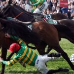 Jockey Robbie Dunne taken to hospital after serious fall at Grand National