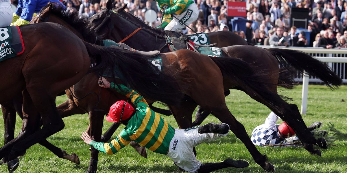 Jockey Robbie Dunne taken to hospital after serious fall at Grand National