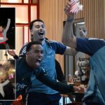 Arsenal players and staff celebrate Premier League title victory after 22-year wait
