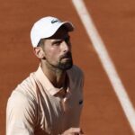 Djokovic faces crowd hostility but secures win in French Open second round