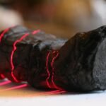 AI aids in decoding carbonized Herculaneum scroll from Vesuvius eruption, revealing ancient texts