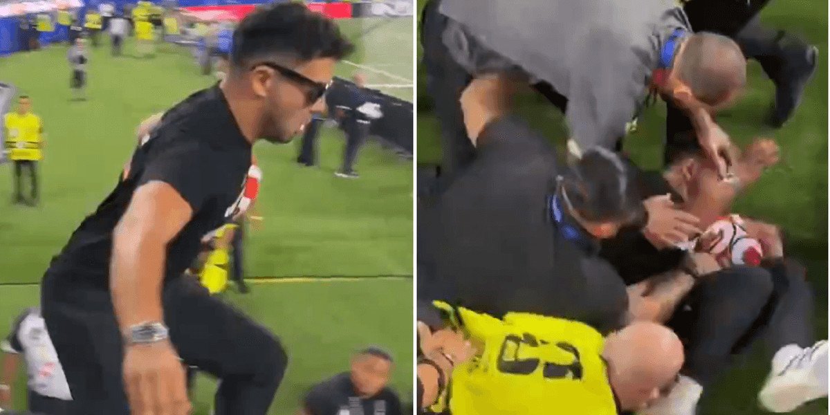 Streaker tackled by security moments after entering pitch during World Cup match