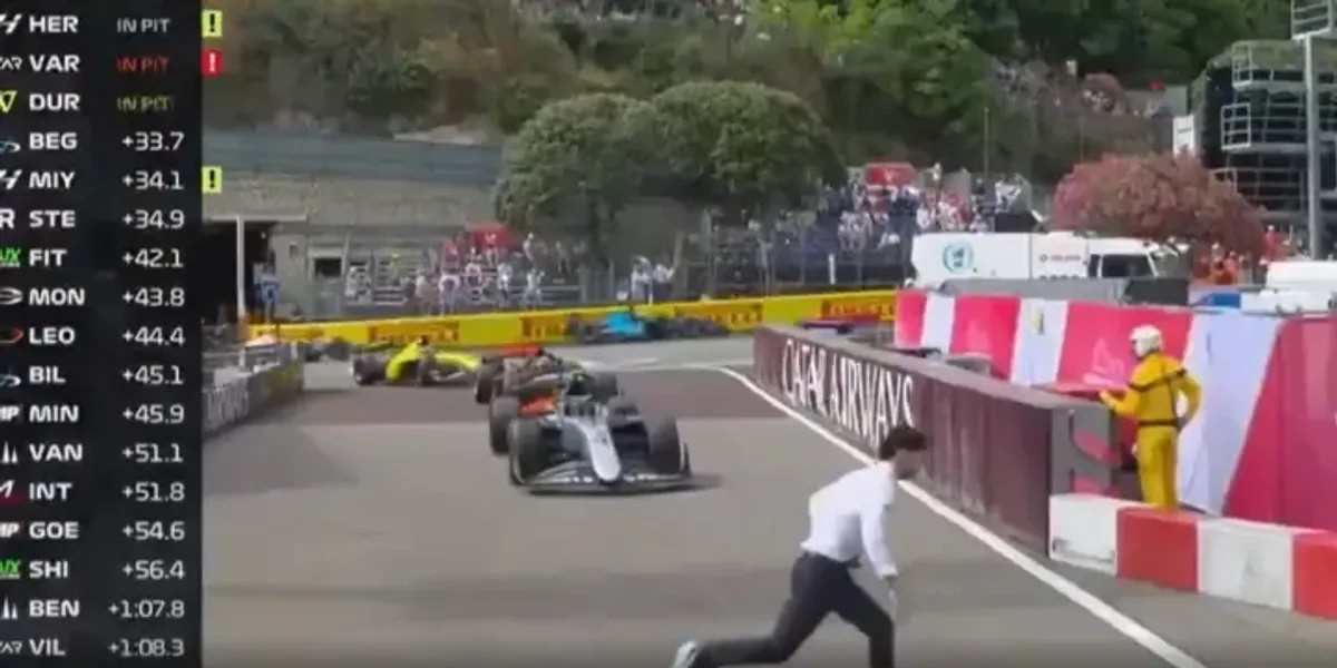 Track worker narrowly avoids collision with car during Formula 2 race in Monaco