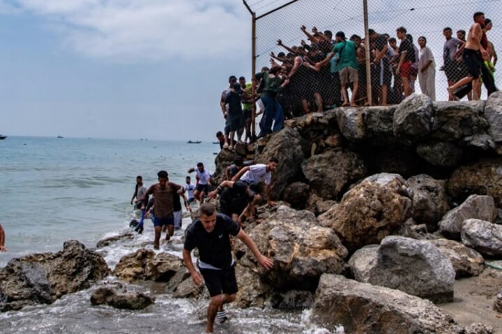 At least 18 dead as 49,000 migrants breach Morocco-Spain border in Ceuta surge