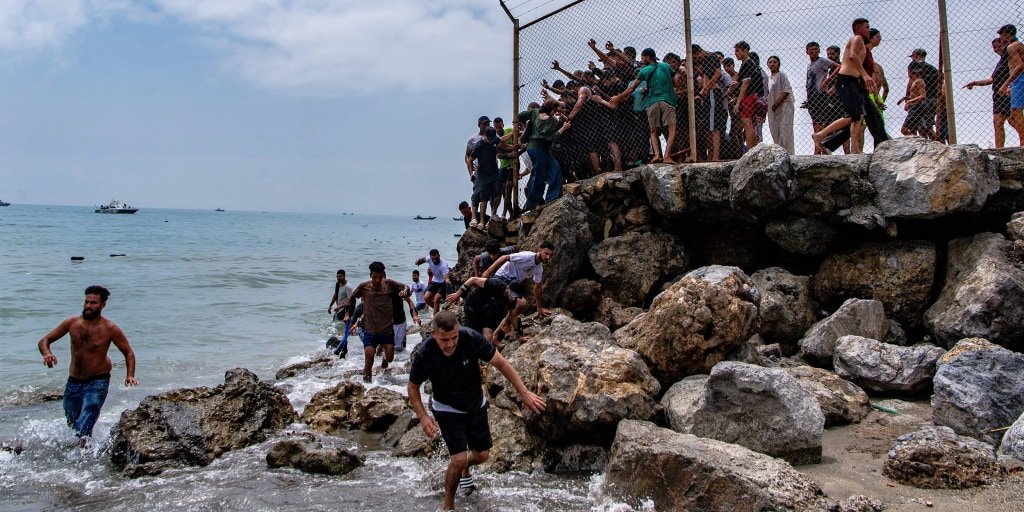At least 18 dead as 49,000 migrants breach Morocco-Spain border in Ceuta surge