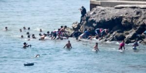 Ceuta requests national emergency as thousands of migrants cross from Morocco into Spanish enclave