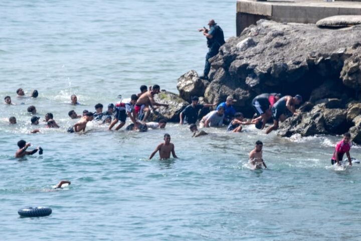 Ceuta requests national emergency as thousands of migrants cross from Morocco into Spanish enclave