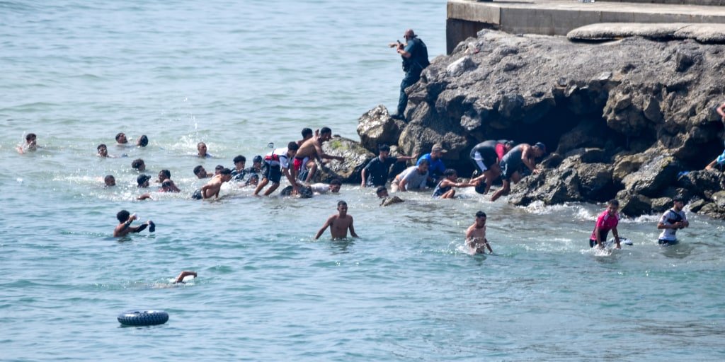 Ceuta requests national emergency as thousands of migrants cross from Morocco into Spanish enclave