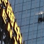 China identifies pilot killed in crash into country's tallest building
