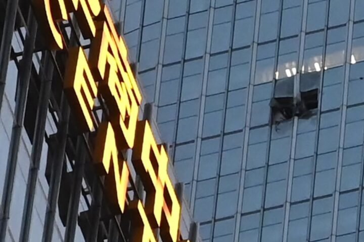 China identifies pilot killed in crash into country's tallest building