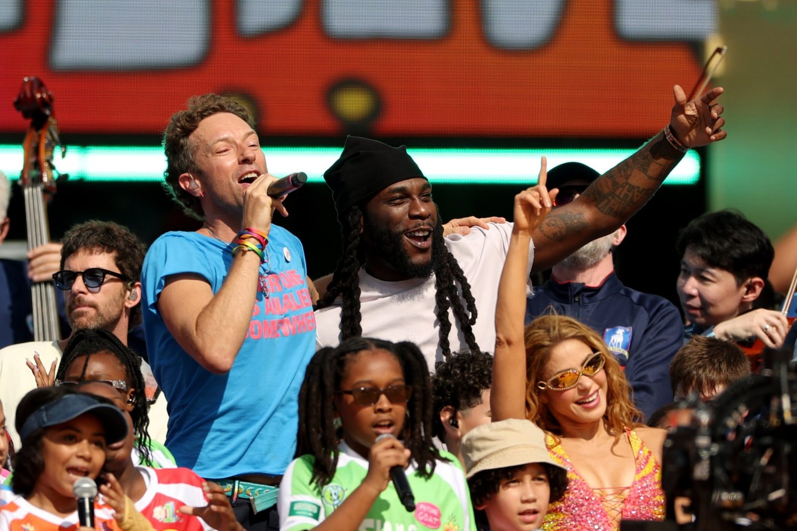 Chris Martin's World Cup half-time show criticized as overly contrived and lackluster