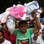 Indian police arrest dozens amid violent protests following the rape and murder of a girl