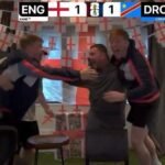 Luke Littler celebrates England's victory over DR Congo alongside I'm a Celeb winner