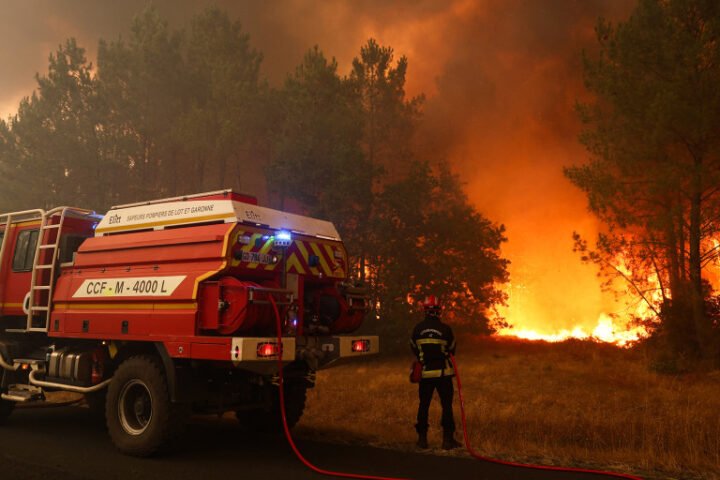 Macron visits wildfire battleground in France, pledges to support fire crews